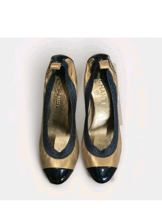 CHANEL Shoes - CHANEL Gold Leather Heel Pumps with Black Patent Cap Toe